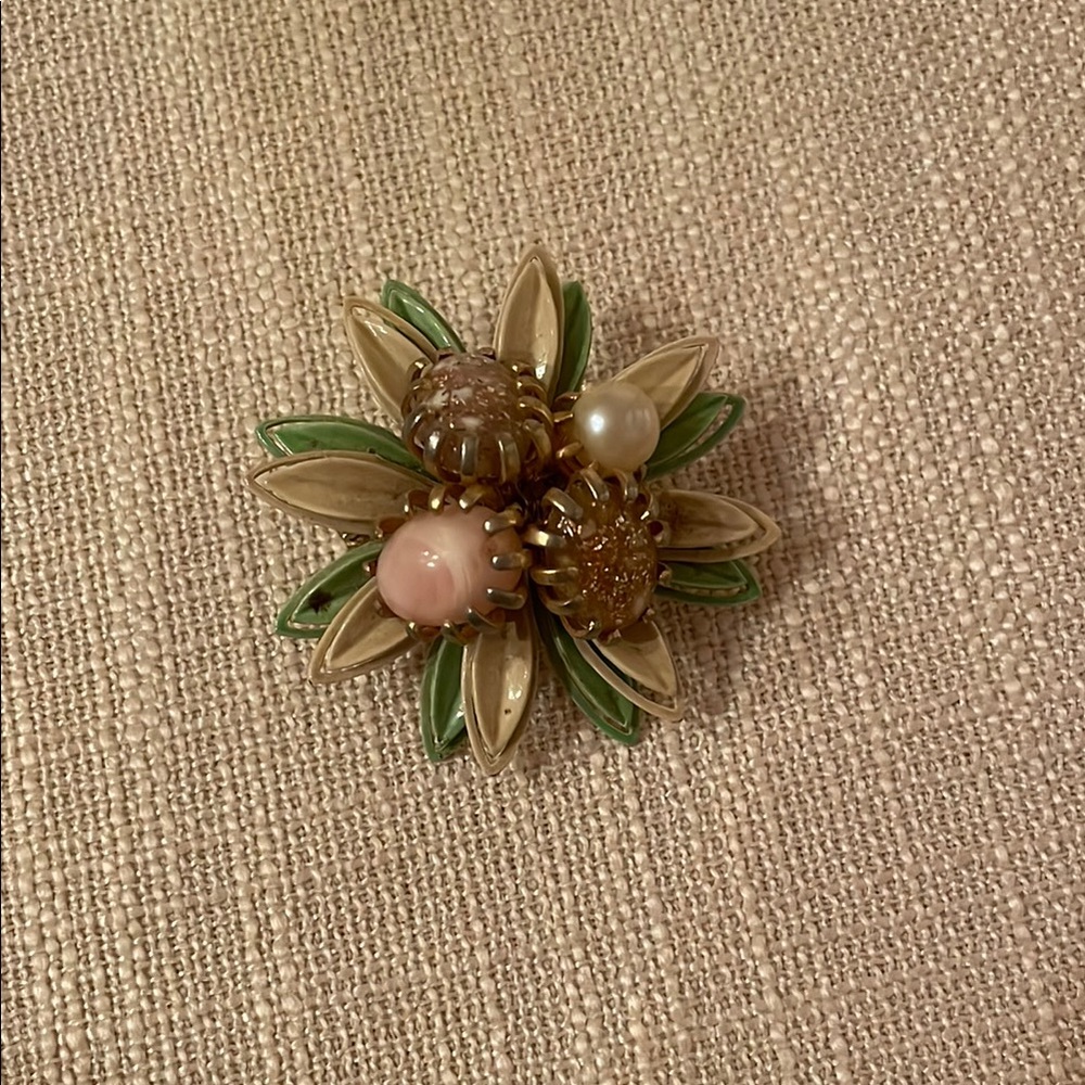 Elegant Floral Brooch with Green and Cream Accents